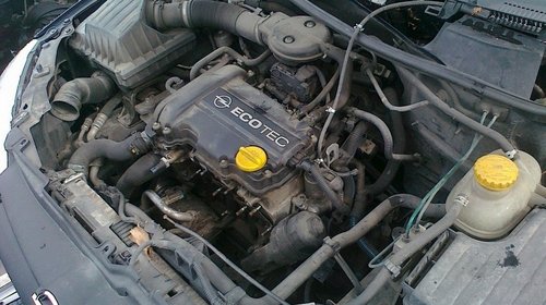 Amortizor cu arc si flansa pentru Opel Corsa C 1.0 12v Z10XE , 1.2 16v Z12XE