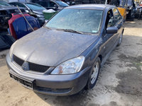 Ansamblu stergator cu motoras Mitsubishi Lancer 2006 Limuzina 1.6 i