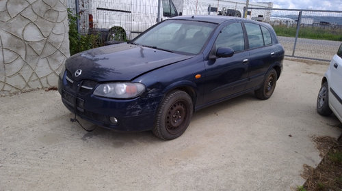 Broasca USA fata spate Nissan Almera 2003