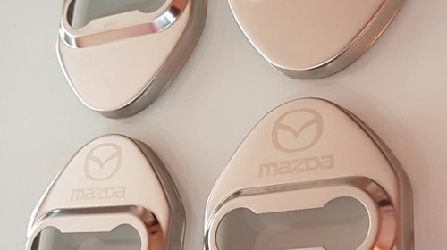 Capace protecție incuietoare usi cu logo Mazda