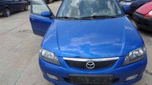 Capota Mazda 323 DIN 2004