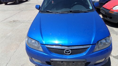 Capota Mazda 323 DIN 2004