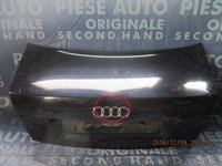 Capota spate Audi A4 (putin infundat deasupra la emblema)