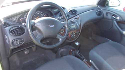 dezmembram ford focus ghia sedan din 2000-1,8 benzina