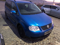 Dezmembram VW Touran 1.9 tdi cod BKC cutie manuala 6+1 trepte cod cutie GQN 2005 7 locuri