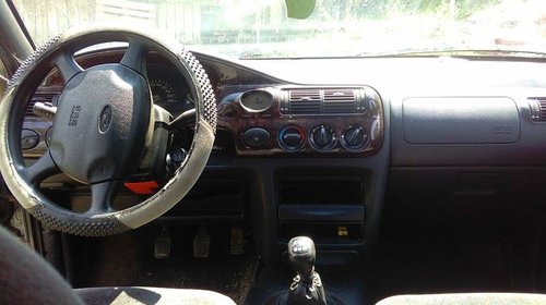 Dezmembrez ford escort 1.8 td