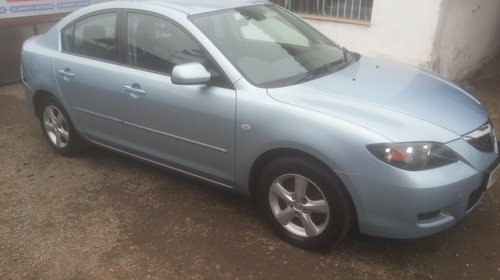 Dezmembrez Mazda 3 1.6 77kw 105cp 2007