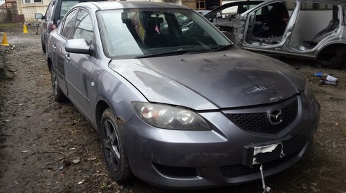 Dezmembrez Mazda 3 1.6 78kw 105cp 2006