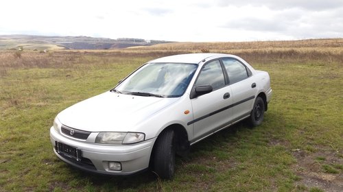 Dezmembrez Mazda "323" 1998