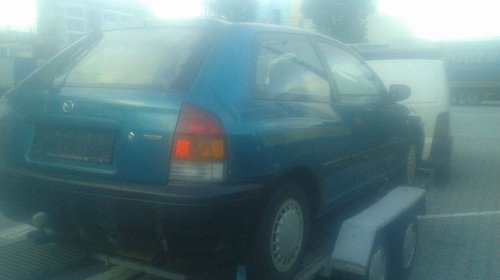 Dezmembrez Mazda 323