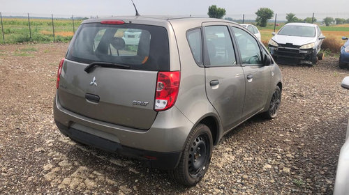 Dezmembrez Mitsubishi Colt 1124 cm3 benzina euro4 55 kw an 2009