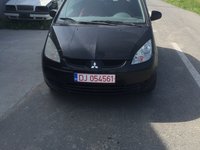 Dezmembrez mitsubishi colt din 2007 motor 1.3 benzina 70 kw