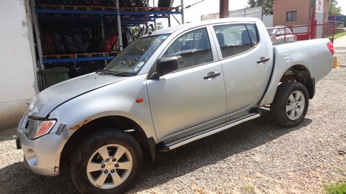 Dezmembrez Mitsubishi L200 2.5 100kw 136cp 2006