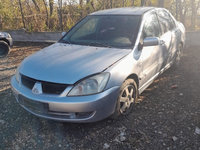 Dezmembrez Mitsubishi Lancer 1.6i