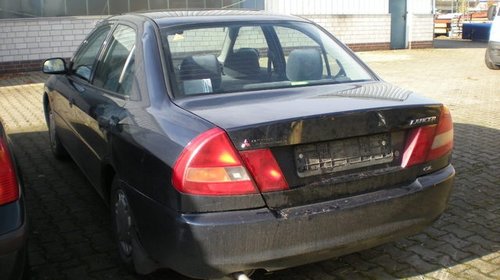 Dezmembrez mitsubishi lancer 97