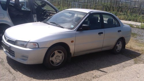 Dezmembrez mitsubishi lancer