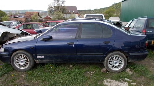 Dezmembrez nissan primera 2.0 I