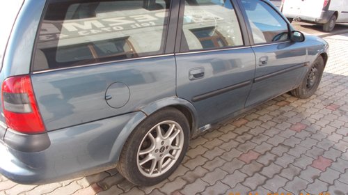 DEZMEMBREZ UN OPEL VECTRA 1999 1,8 BENZINA