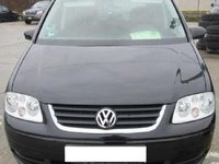 Dezmembrez Volkswagen Touran 2.0 TDI din 2005 volan pe stanga
