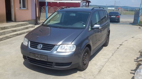 Dezmembrez vw touran an fabr 2006 motor 2 litri tdi cutie automata dsg climatronic volan stinga !!!!!