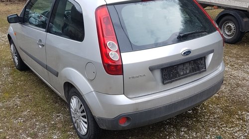 Far dreapta Ford Fiesta 2007 hatchback 1.4 td ambient