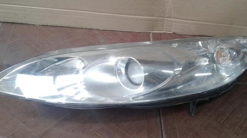 Far stanga cu lupa PEUGEOT 407 2004 2005 2006 2007 2008 2009 2010 cod 0301213201