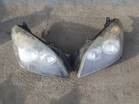 Far stanga / dreapta Opel Astra H mici defecte optice ( poze ) 24451033 Original