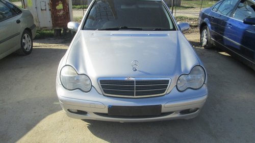 Faruri Mercedes C-Klass din 2002