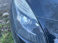 Faruri stanga dreapta renault scenic 3 2009