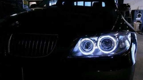 Faruri Tuning cu lupa si angel eyes pentru BMW E90,E91[NOI,24luni/far]