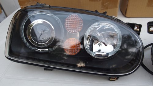 faruri vw golf 3 model 1992-1997 cu angel eyes si lupa h1+ h1 design PE NEGRU marca depo