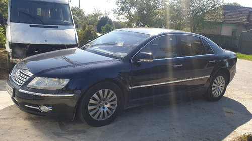 Faruri vw phaeton de europa(prezinta defect la urechi) set