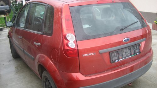 FORD FIESTA 2007 portiere,geam , incuietori ,