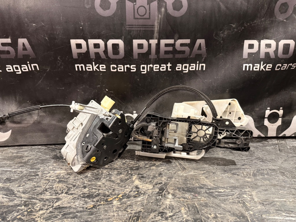 Incuietoare usa stanga spate Volkswagen Passat B6 - imagine 1
