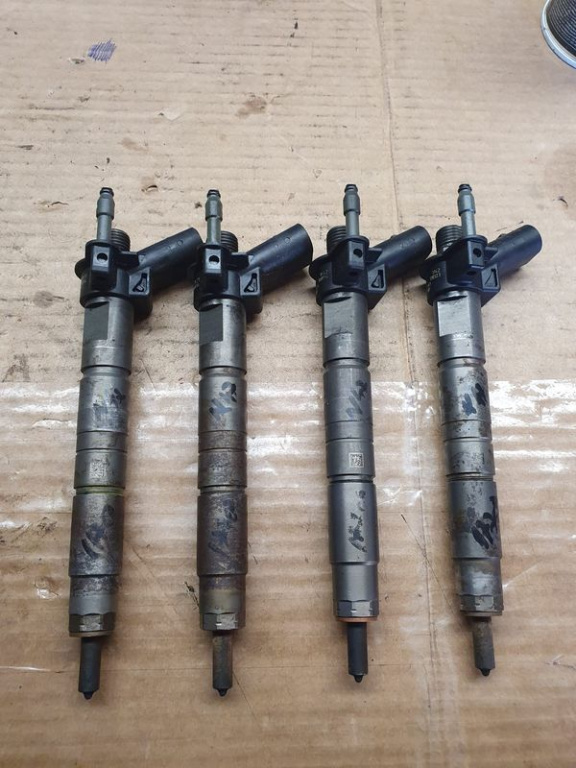 INJECTOARE BMW COD MOTOR N47D20A COD PIESA 7797877-05 PRET PER BUCATA