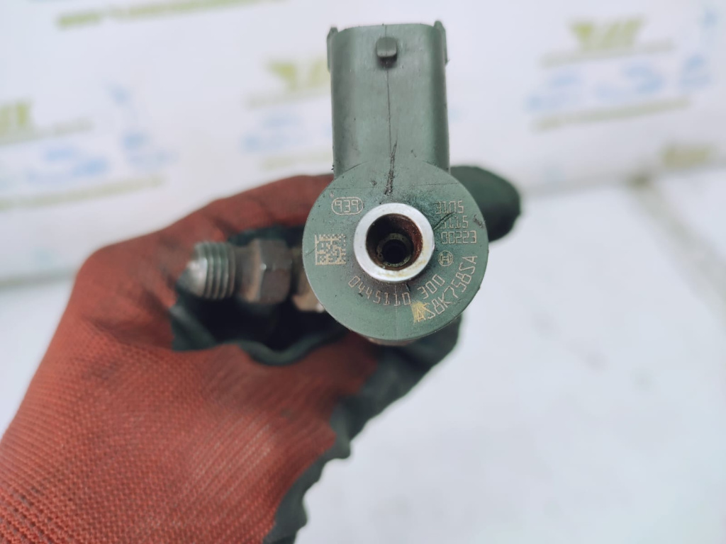 Injector 1.6 jtd 0445110300 Opel Combo C