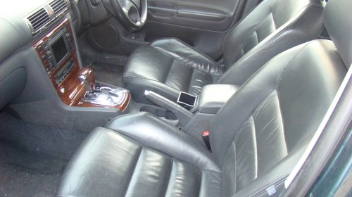 Interior de piele skoda superb,impecabil cu i