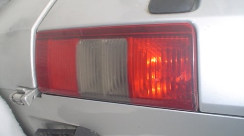 Lampa stanga spate opel combo