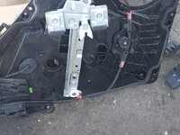 Macara geam stanga spate manuala Ford Fiesta an 2010