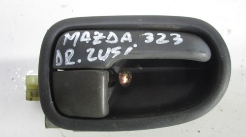 MANER INTERIOR USA DREAPTA FATA MAZDA 323 FAB
