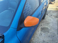 Oglinda stanga cu defect la carcasa Dacia Spring 2021