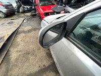 Oglinda stanga cu mici defecte Opel Corsa C 1.7 dti 55Kw 75CP Euro 3 2002 Gri
