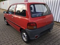 Oglinda stanga electrica DAIHATSU Cuore IV (L501) 0.8 anul 1997