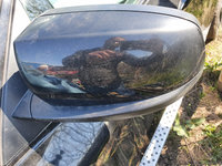 Oglinda stanga heliomata E71 X6 oglinda provine dupa o masina cu volan stanga