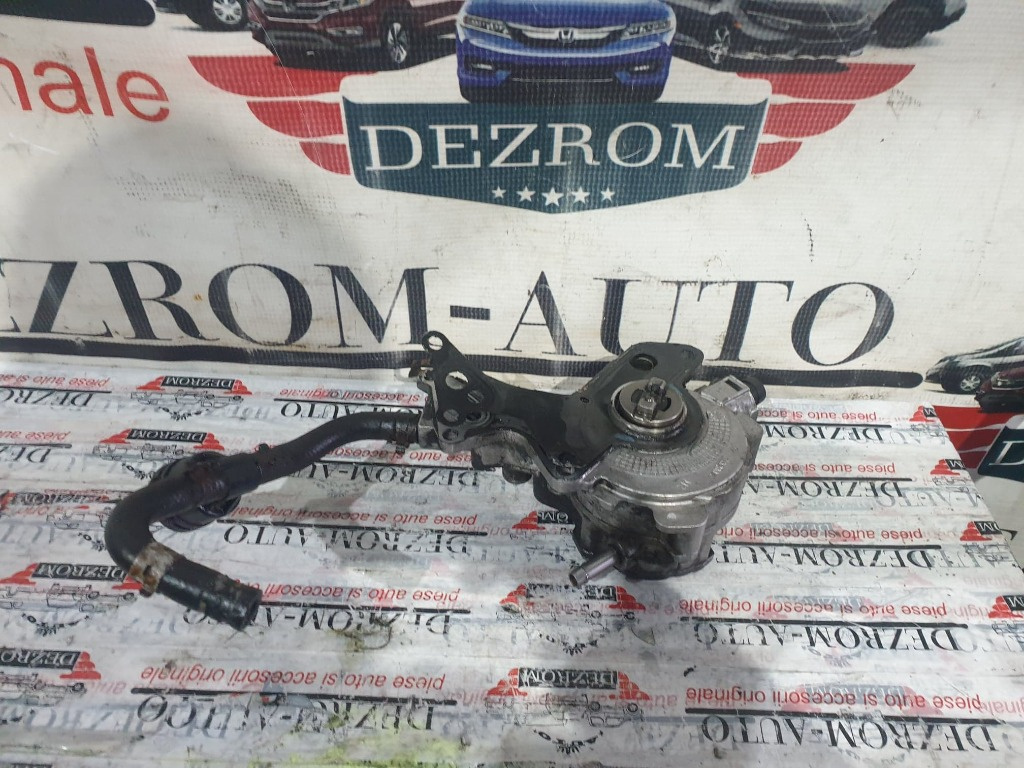 Pompa vacuum originala VW Fox 1.4 TDI 70 cai cod piesa : 038145209N