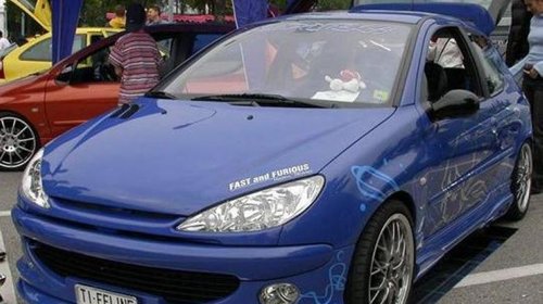 Prelungire adaos fusta spoiler bara fata ( ingusta ) Peugeot 206