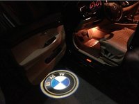 Proiector laser cu logo BMW pentru iluminat sub portiera