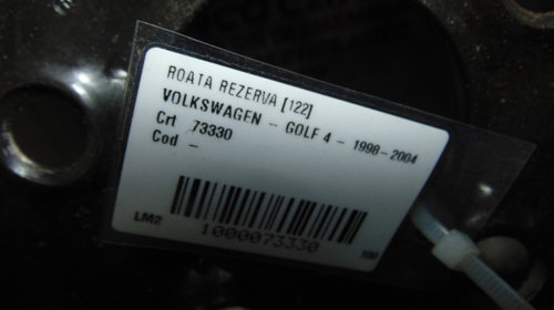 Roata rezerva Volkswagen Golf 4 din 2002.