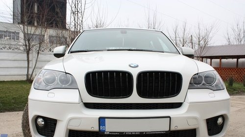 Set 2 faruri Bi-Xenon Angel Eyes compatibil cu BMW X5 E70 LCI (2010-2013)