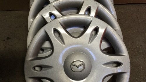 Set 4 Capace roti Mazda 14 " + 4 inele metal